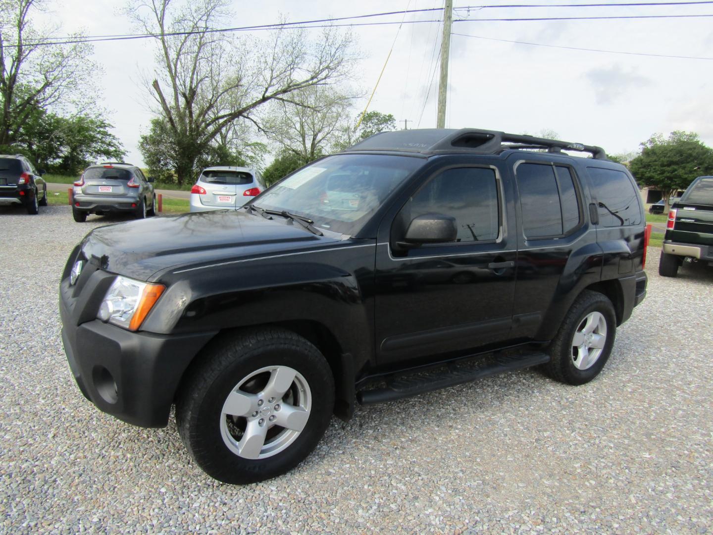 2005 Black /BROWN/TAN Nissan Xterra (5N1AN08U85C) with an 6 Cyl engine, Automatic transmission, located at 15016 S Hwy 231, Midland City, AL, 36350, (334) 983-3001, 31.306210, -85.495277 - Photo#2